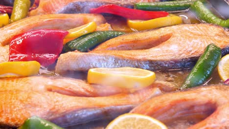 salmon with lemon and peppers cooking