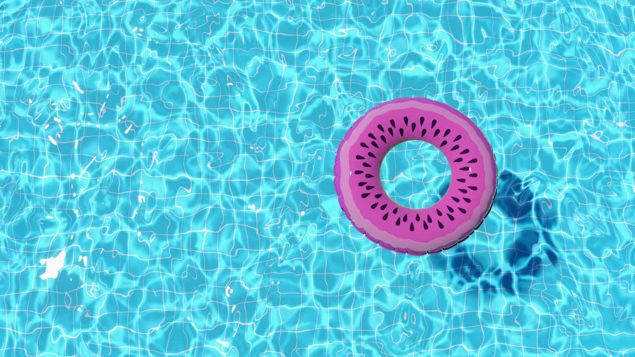 Loop inflatable swimming ring floats in the pool in summer top view