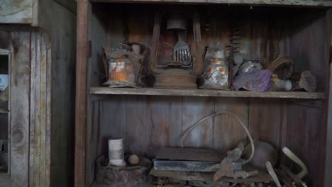 Damaged-household-items-due-to-a-volcanic-eruption-disaster-on-the-cupboard