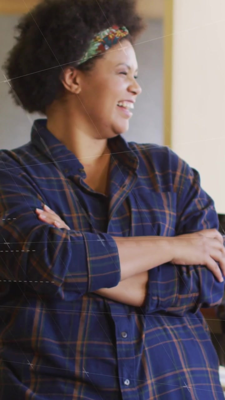 Vertical video: Lead woman smiling in office, overlaying as team tapping PC updating chart to sync