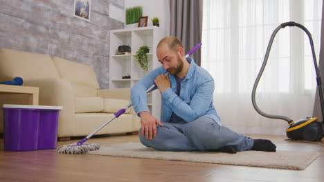 tired man sitting on cozy carpet
