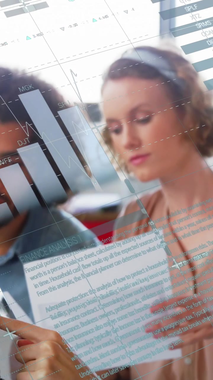 Animation of data processing over diverse man and woman discussing over a document at office
