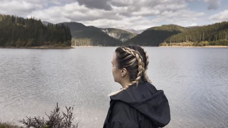 Portrait-Of-A-Woman-Near-Bolboci-Lake-In-Bucegi-Mountains,-Romania