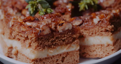 Traditional-Walnut-Cake-On-Plate-Rotating-1