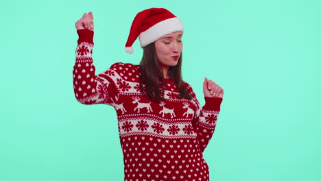 Young-adult-girl-in-Christmas-sweater-listening-music,-dancing-disco-fooling-around-having-fun