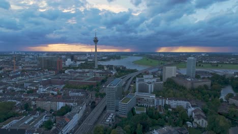 panoramic view of dusseldorf and the rhine tower on an evening sky