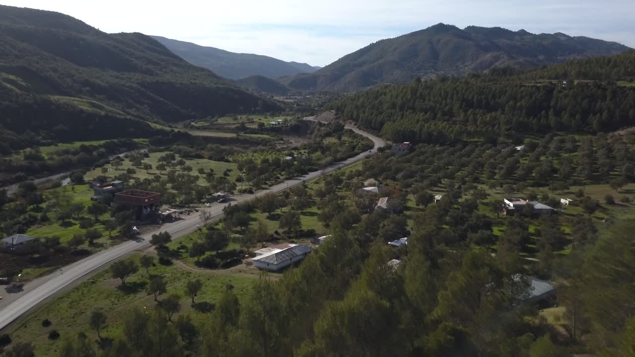 AERIAL: Green Mountains and Road in Morocco