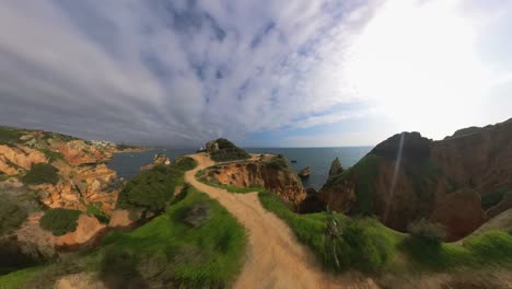 The-stunning-beauty-of-the-beach,-cliffs,-waves,-and-sea-in-Portugal's-Lagos-region,-specifically-the-Ponta-da-Piedade-area