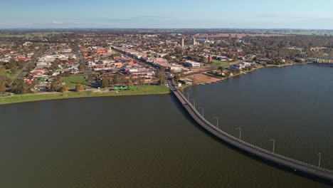 aerial reveal of the bridge between yarrawonga and mulwala over the lake