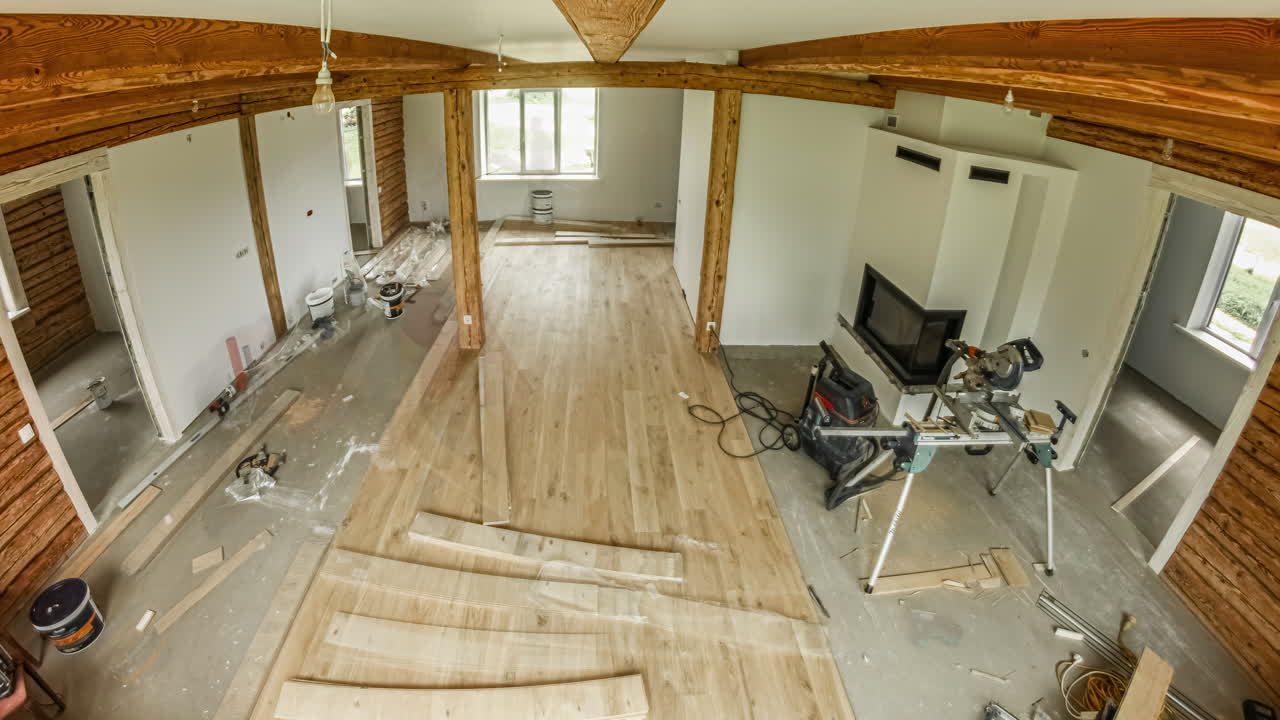 Installing hardwood flooring in a rustic, new home or cabin - time lapse