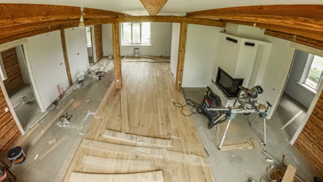 installing hardwood flooring in a rustic, new home or cabin - time lapse