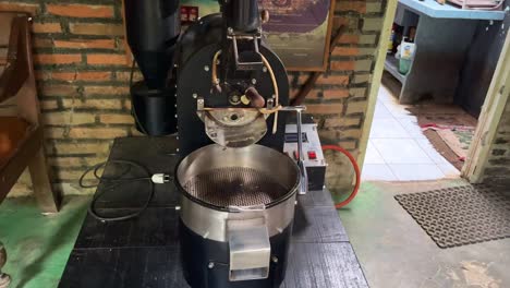 Coffee-grinder-machine-on-the-wooden-table