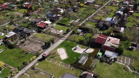 flight over typical european gardening areas as recreational spaces for suburban folks drone footage
