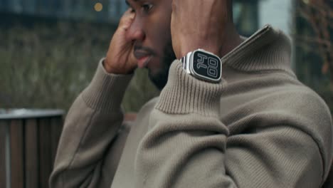 man listening to music outdoors