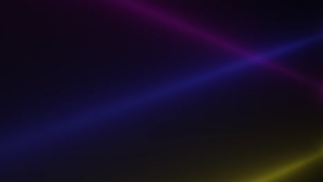 Glowing-rainbow-spotlight-beams-on-black-gradient