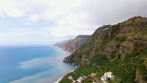 Trace-the-ridgelines-of-Madeira's-mountain-ranges,-where-jagged-peaks-pierce-the-sky,-creating-a-dramatic-backdrop-for-the-island's-timeless-landscapes