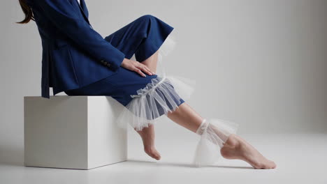 fashionable blue pantsuit with tulle ruffles