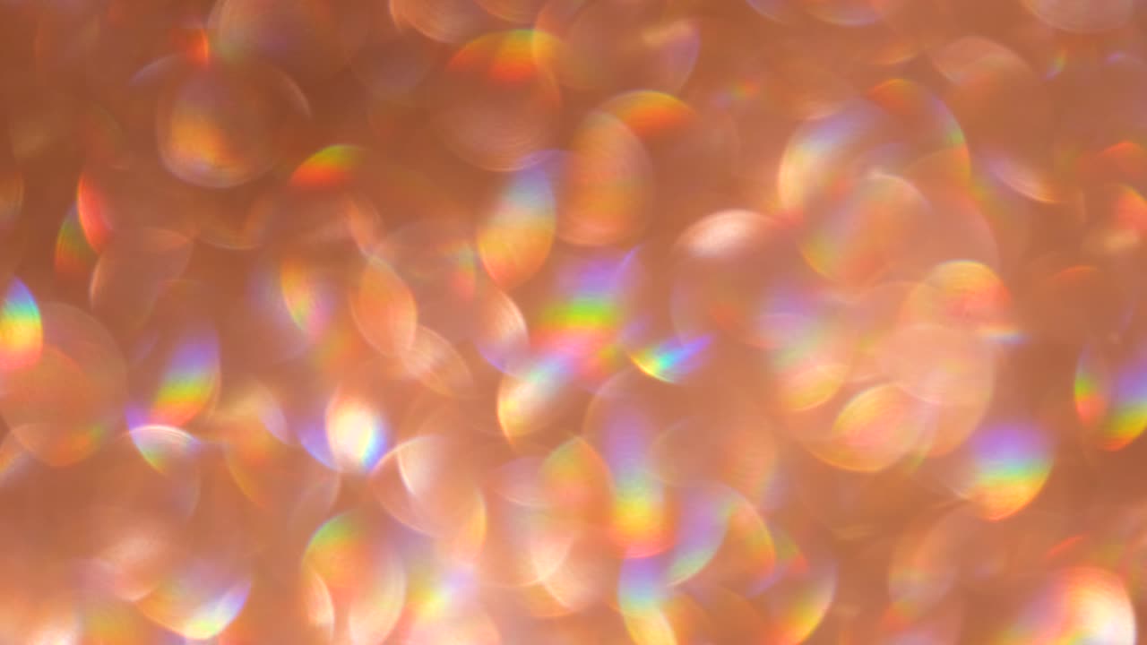추상적인 반이는 4k 비디오 배경 황금색과 오렌지색 반이는 배경과 반이는 텍스처 금빛 반이는 빛, 린 스파크, 반이는 반이는 포일 배경