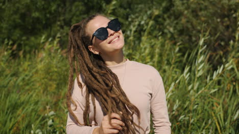 woman with dreadlocks outdoors