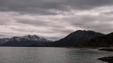 view from fjord of majestic mountains in kvaloya island, norway