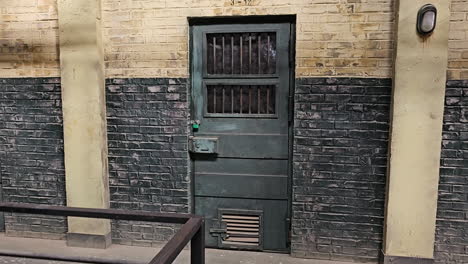 locked old korean prison cell at iksan film drama set - revealing pull back