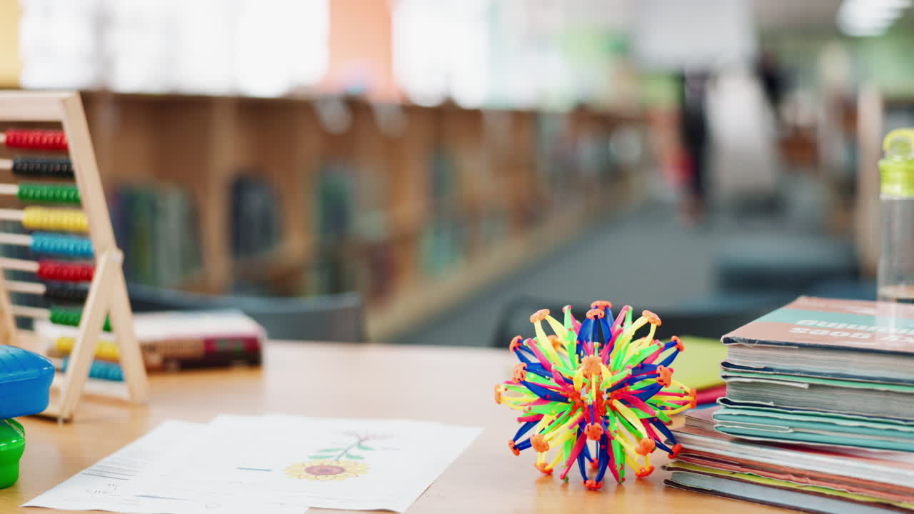 Library desk with educational materials