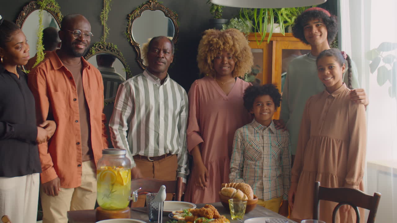 Portrait of Happy African American Family at Home Dinner Party