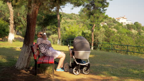 mom with baby having good day in the park