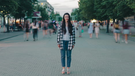 Woman standing in city street