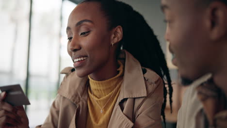 Couple,-talking-and-credit-card