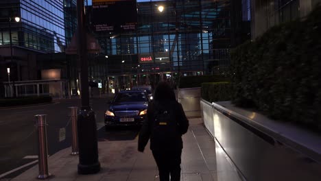 walking down street in london, uk at night. pov wide shot,