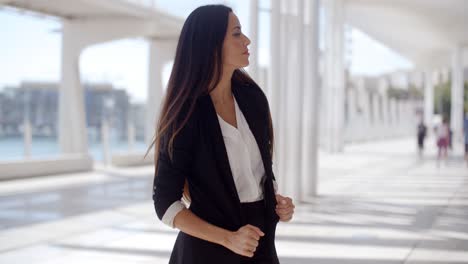 Beautiful-Business-Woman-Standing-and-Looking