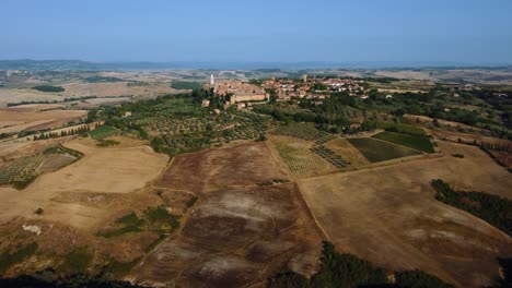 pienza in the heart of val d' orcia is a beautiful old town near siena in tuscany, italy, a masterpiece of mediterranean traditional architecture in the idyllic landscape with hills