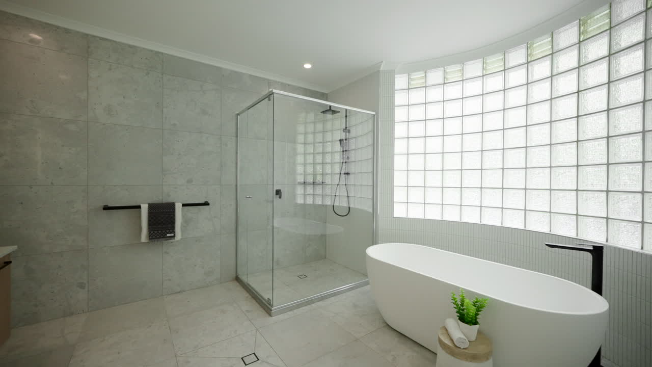 Modern Minimalistic Home Master En Suite Double Vanity Large Tub And Separate Toilet Room, Reveal Past Doorframe To Curved Tiled Window