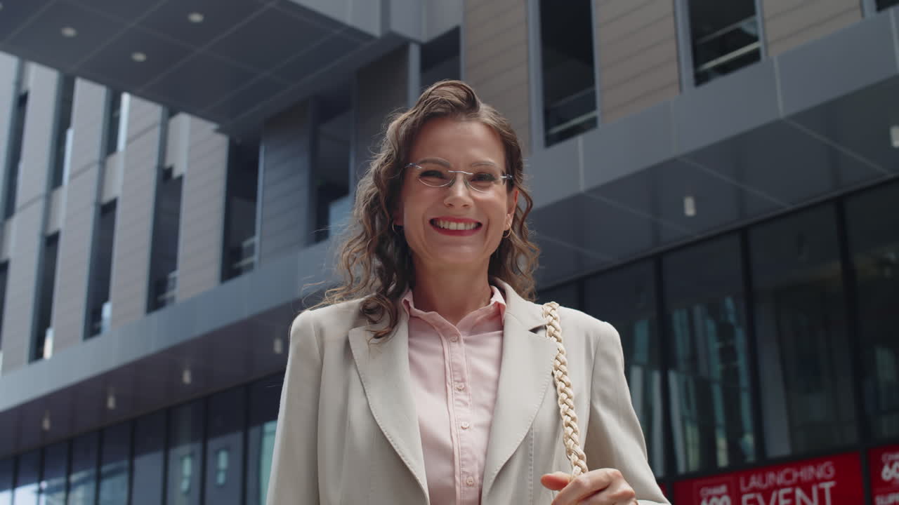 Middle-aged Businesswoman Looking at Camera Outdoors