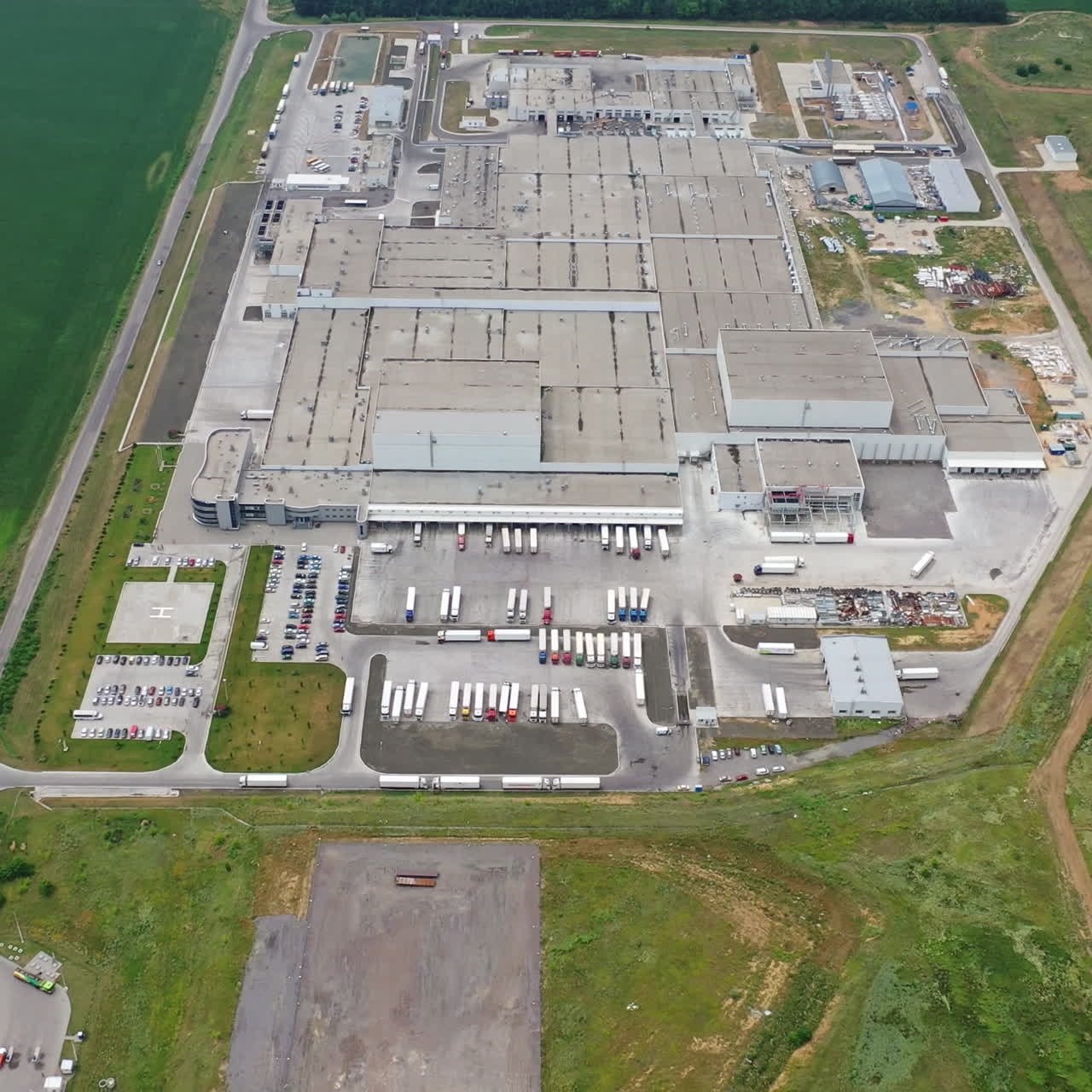 Aerial view of a modern industrial plant. Modern Factory Exterior.