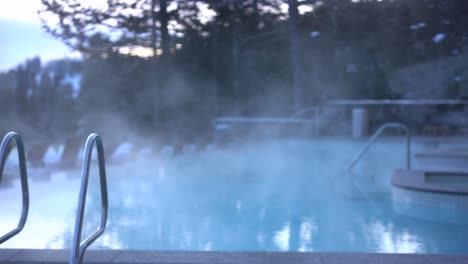 steam-emanating-from-pool-in-winter