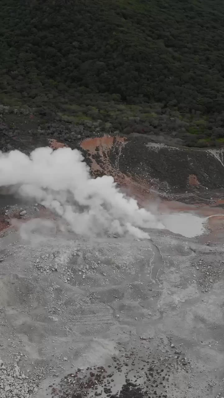 Vertical Aerial Fly Mount Kirishima Volcano with White Smoke Crater Kyushu Japan