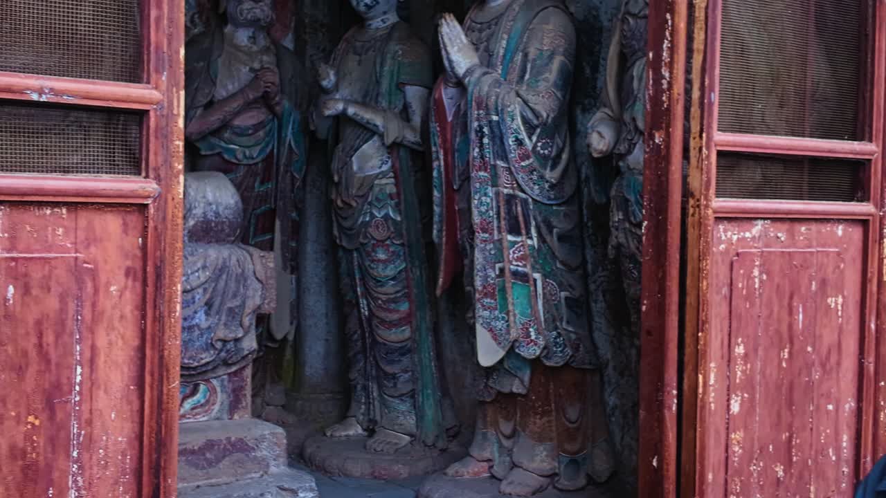 Stone Carving Of A Guardian Figure From The Ancient Maijishan Grottoes In Tianshui, Gansu Province, China. Panning Left Shot