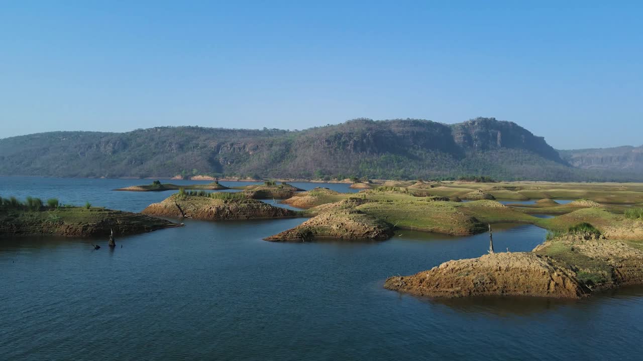 Stunning aerial drone shot of Karamchat Dam, capturing the vastness of the dam and surrounding landscapes.