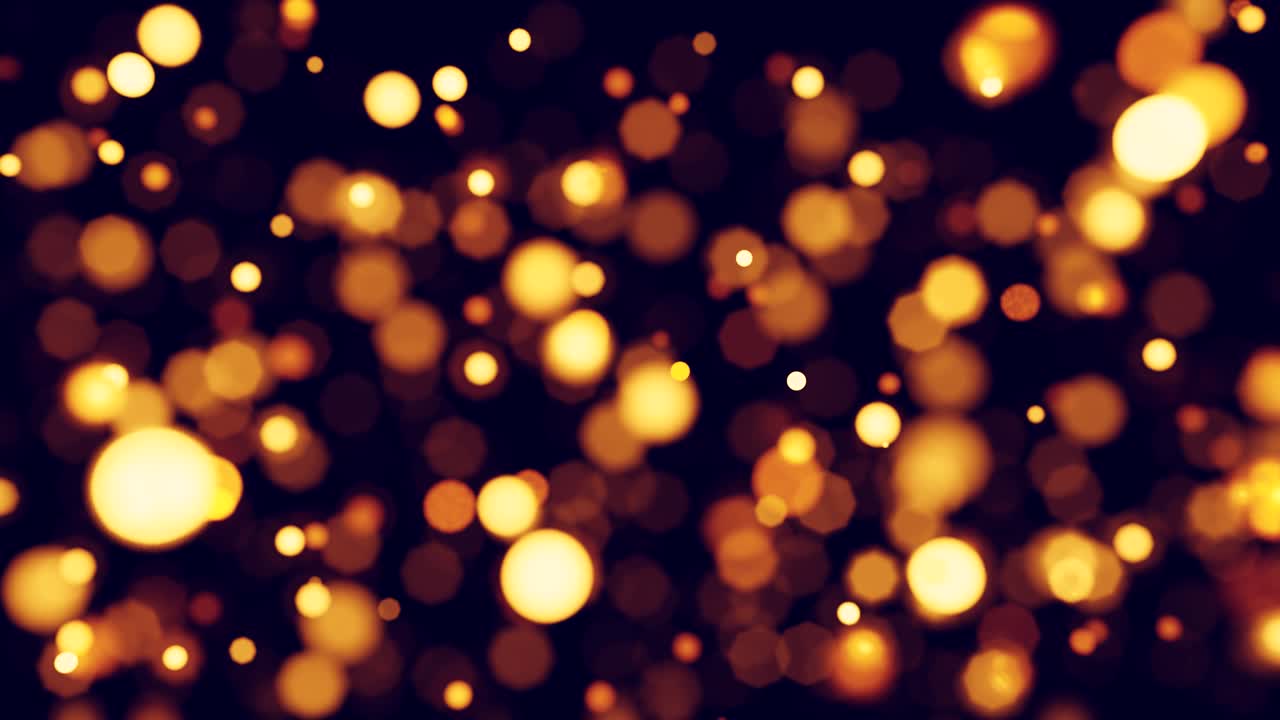 Luci Bokeh Dorate Scintillanti che si Muovono su Sfondo Scuro
