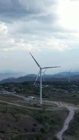 aerial view of wind turbines at sunset, honduras, renewable energy scene.
