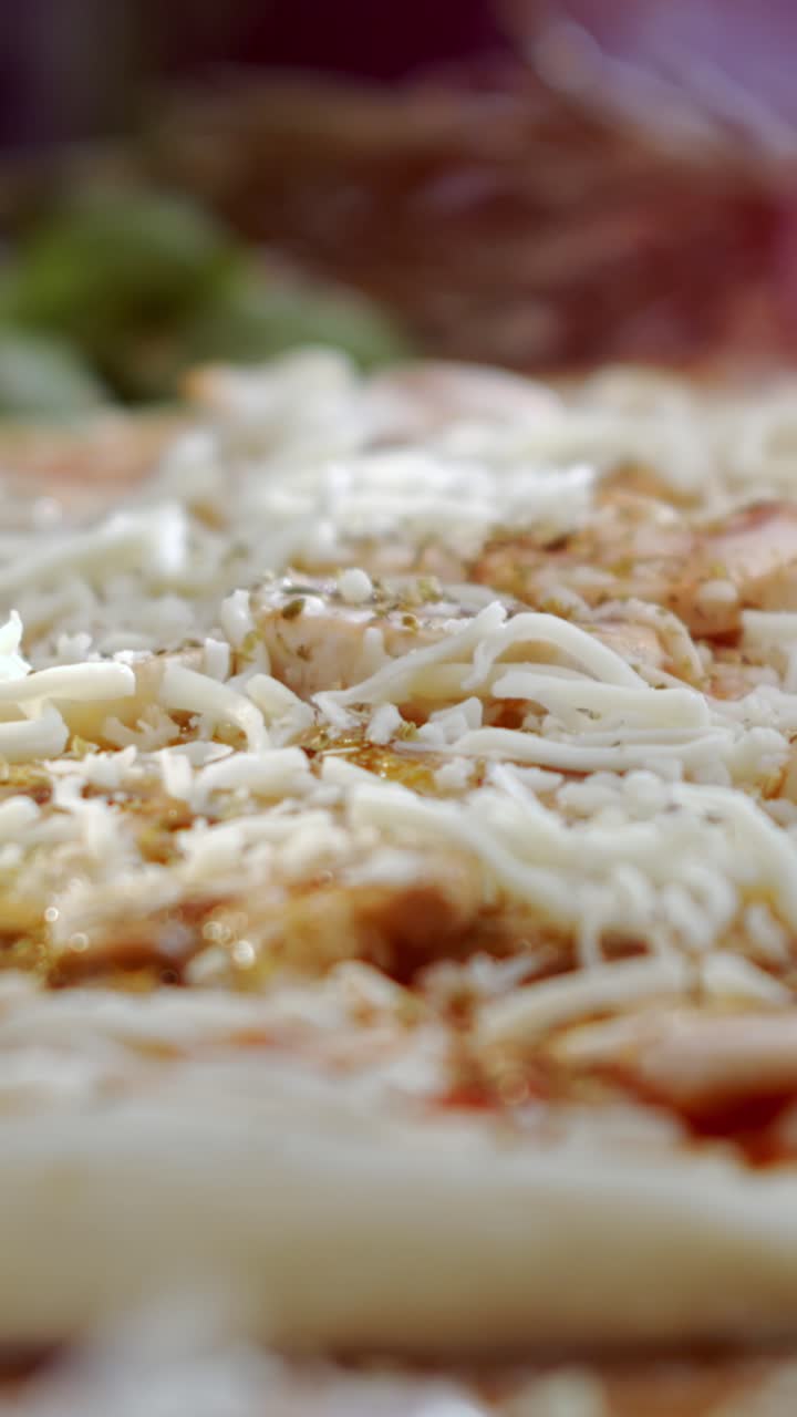 Pizza preparation with peppers and cheese