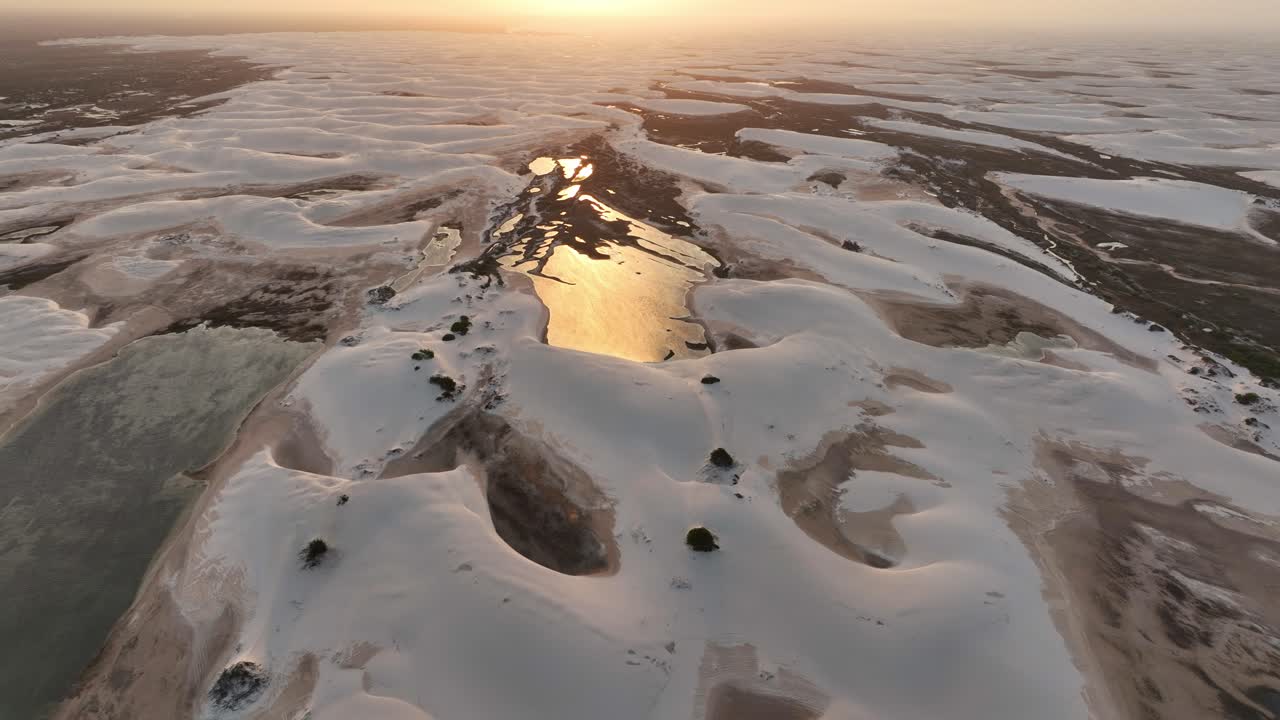 Golden Sunset at Lencois Maranhenses White Sand Dunes, Aerial Dolly In