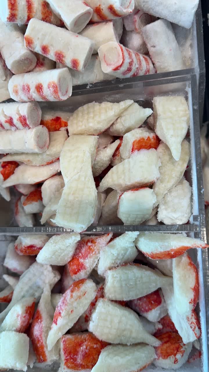 Frozen Imitation Crab Meat Sticks and Flakes in a Seafood Display