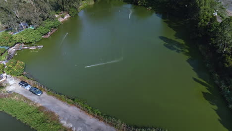 hobby boat racing in a small lake in nam sang wai near shan pui river