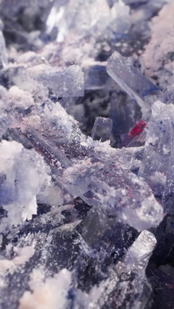 Pattern of colorful organic crystals as background macro view. Cosmetic product for wellness and spa service. Minerals and stones in laboratory