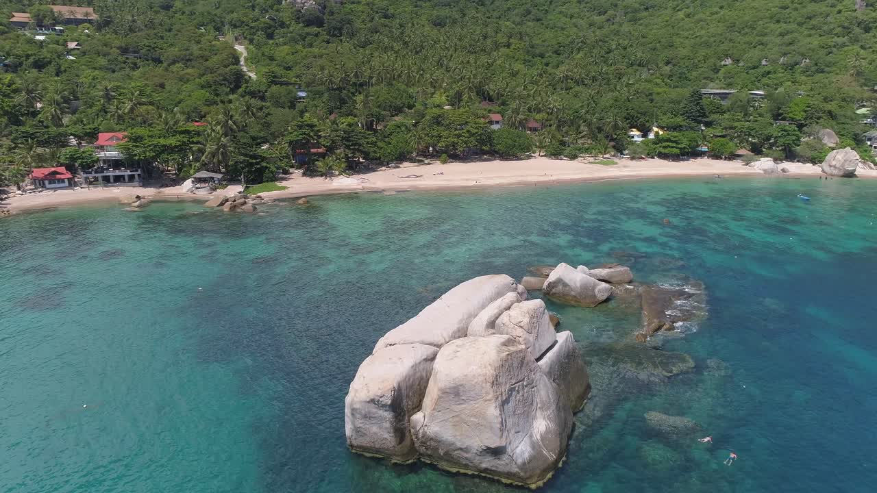 Aerial View of a Tropical Beach with Crystal Clear Water