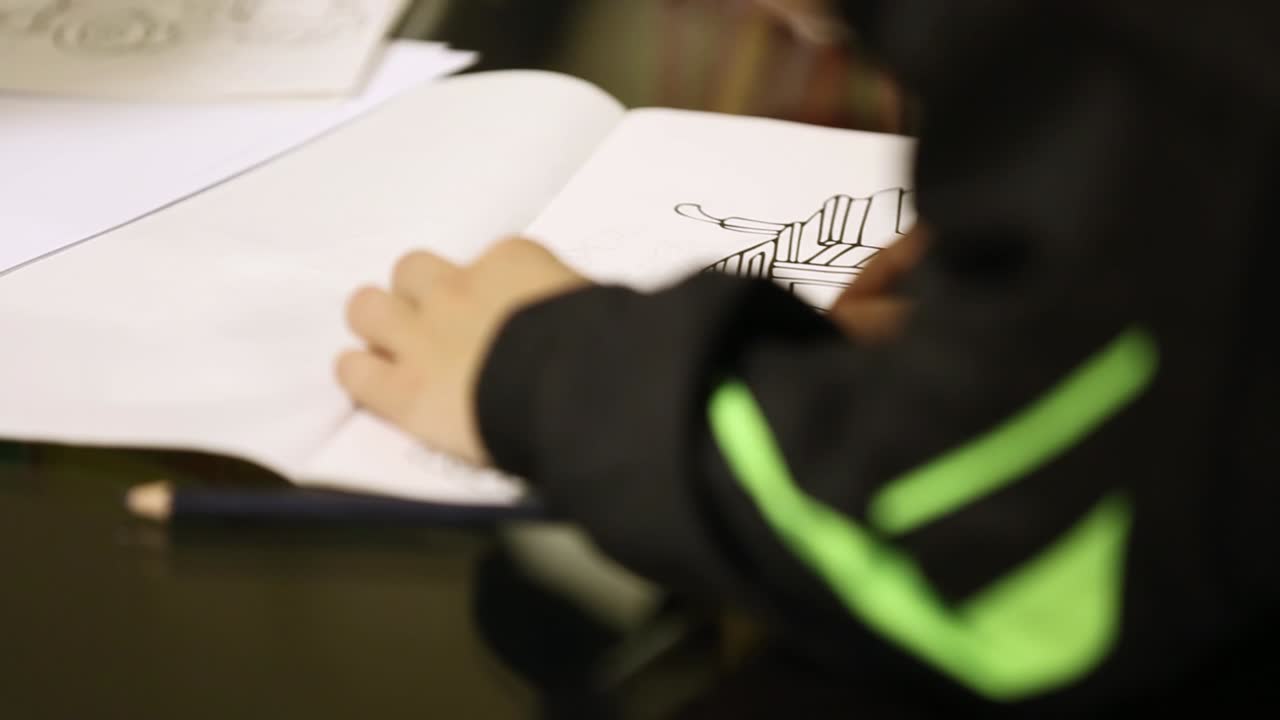 Hands Making Notes At The Conference. Close-up of hands holding pens and making notes at the conference