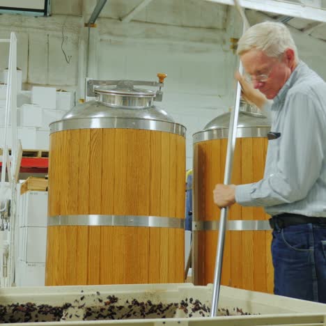 winemaker working in the winery 1